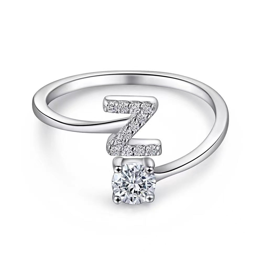 Anello regolabile lettera e punto luce